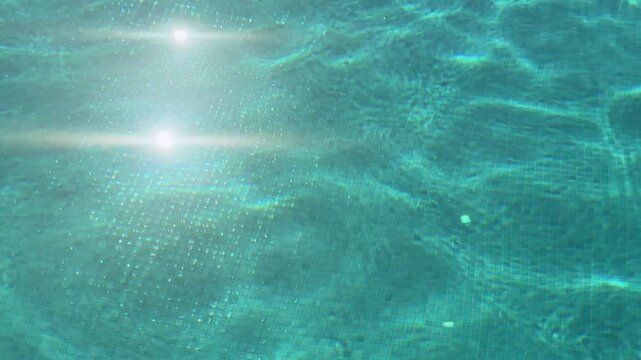 Shimmering Sun Reflection on Pool Water in Polichrono, Greece