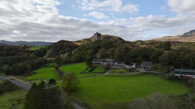 Castell Dolwyddelan and Eryri Mountains from a drone, Snowdonia, Conwy County Borough, Wales, England, United Kingdom