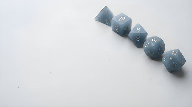 Polyhedral dice set in blue stone with white numerals