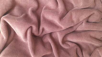 Soft Dusty Rose Towel Fabric Texture Background with Crumpled Waves © widyuta
