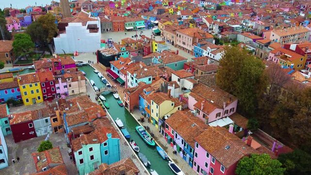 Aerial view of the colorful houses and canal in Burano, Venice, Veneto, Italy.