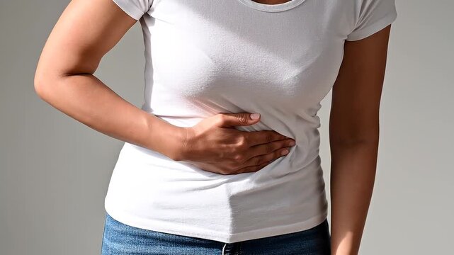 Faceless Woman Holding Her Stomach with Abdominal Discomfort