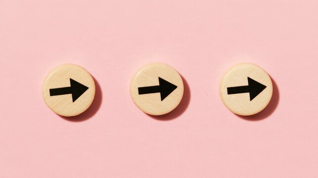 Three Wooden Discs with Right Arrows
