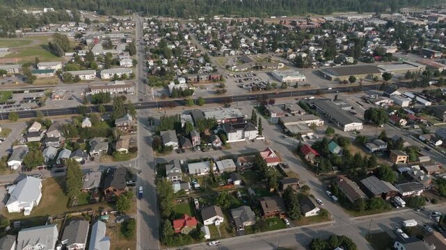 Residential Homes Line Streets In Fernie, British Columbia, Canada, With A Developed Neighborhood. Aerial Rotate Shot