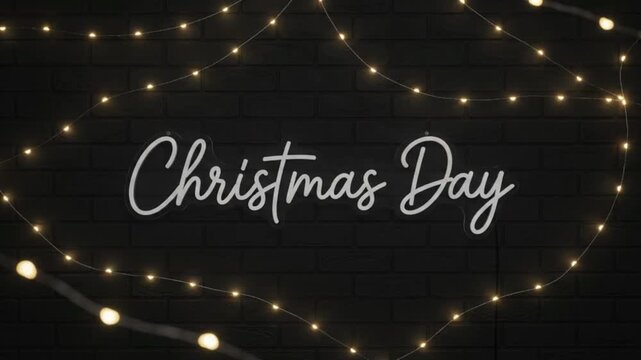 Neon text of Christmas Day framed by glowing string lights on a dark brick wall background