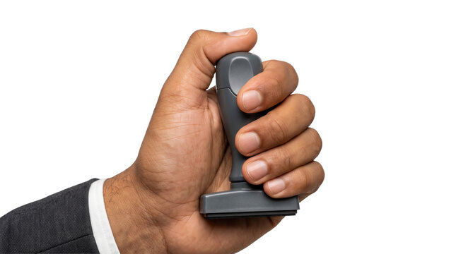 Businessman in dark suit gripping a gray rubber approval stamp firmly in his fist isolated on transparent PNG background