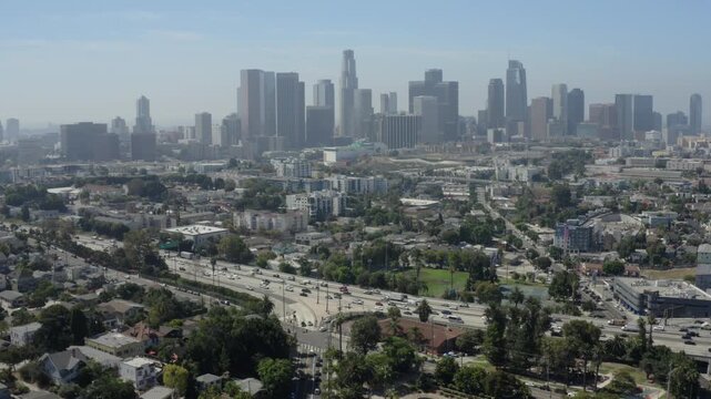 Los Angeles Skyline and Highway 101 Dolly Back Reveal Over Echo Park
