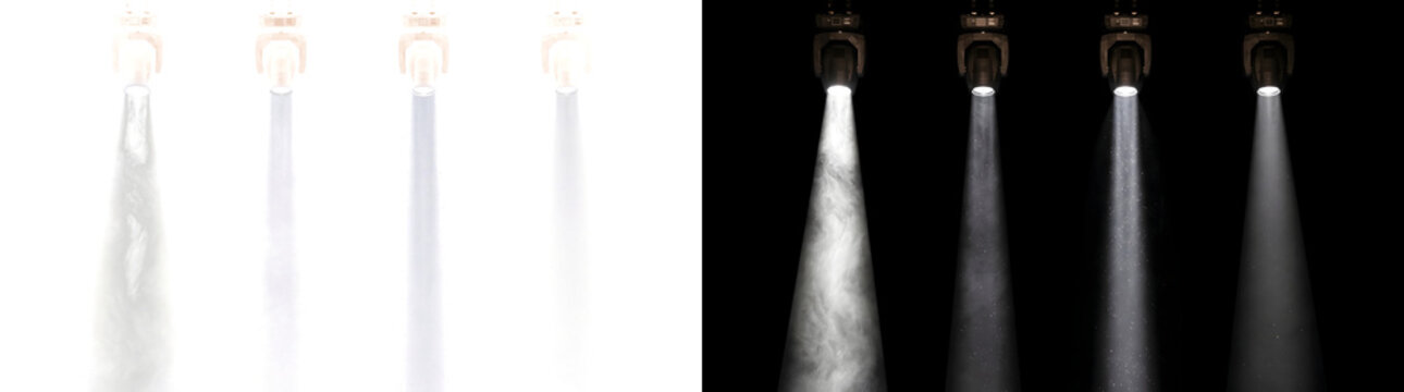 Moving head spotlights casting four white light beams through stage smoke and dust for concert overlays in PNG, Transparent and Black Background Versions
