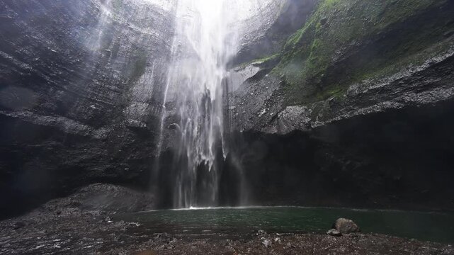 Spectacular view of Madakaripura waterfalls the tallest waterfalls in Java island and second tallest waterfalls in Indonesia.