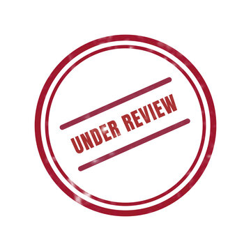 Red under review stamp with crossed lines
