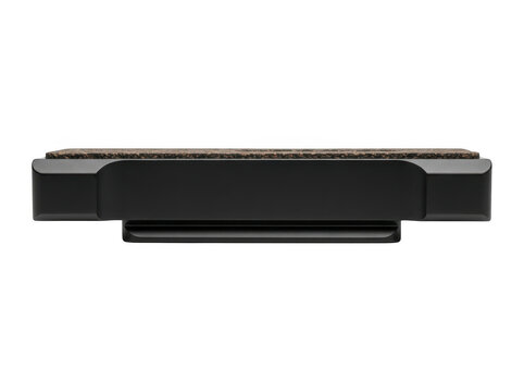 Minimalist black rectangular device with dual slots on top positioned on transparent surface.