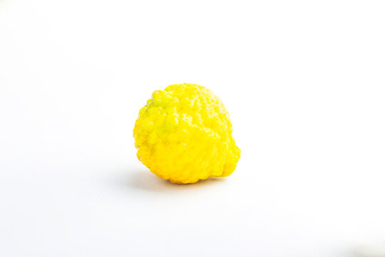Yellow kaffir lime isolated on a white background