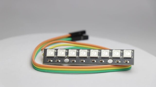 LED strip with rigid PCB or printed circuit board with soldered jumper cables for connections
