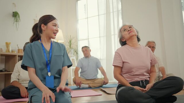 Caregiver senior wellness nursing home meditation class for elderly adult healthcare support gentle exercise calm group care mobility balance relaxation indoor therapy