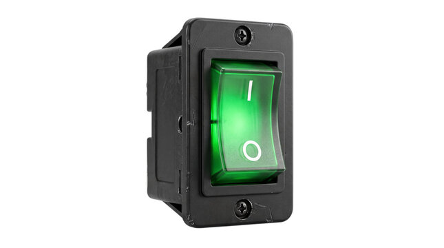 Illuminated green rocker switch in the on isolated on transparent background
