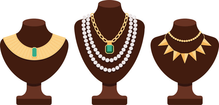 Set of luxury necklaces displayed on brown jewelry store mannequin busts