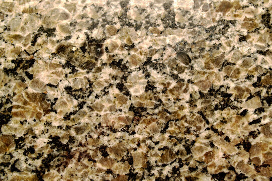 Beige stone terrazzo texture background. Natural pebble surface of warm earth base sheet for wabi sabi interior, earthy branding and artisan packaging. Organic stone pattern rustic artisan material fo