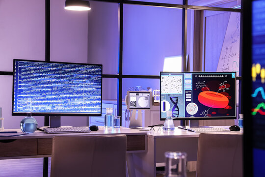 Biotechnology research and medical data analysis, scientist workspace with computer screens showing blood cell count and programming code in laboratory