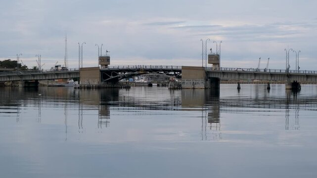 Birkenhead Bridge, a bascule bridge in Adelaide, spanning the Port River with with control towers. A quiet moment at historic maritime crossing point in Port Adelaide, South Australia.