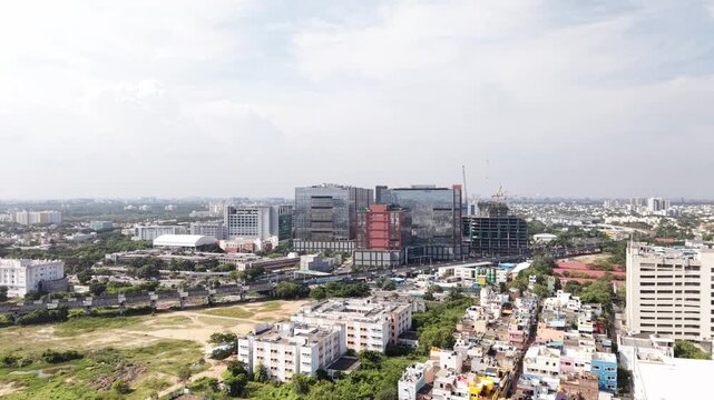 Chennai, Tamil Nadu, India - 12 September 2026: Aerial view of DLF Downtown featuring modern glass office buildings, surrounding urban landscape, and clear sky.
