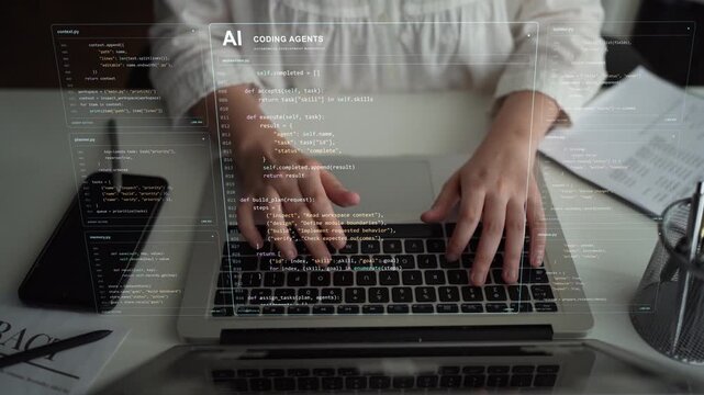 A person types on a laptop. Specialized coding agents coordinate planning, implementation and verification, illustrating how an AI orchestrator organizes work across software development.