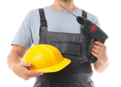 Home improvement and renovation services, construction worker holding a power drill and yellow safety helmet for professional building maintenance work