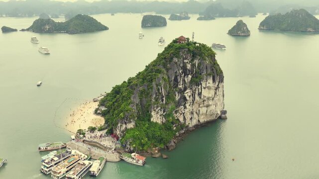Aerial view of Ha Long Bay, Vietnam with cruise ships, islands among limestone islands. UNESCO World Heritage Site. Popular landmark, famous destination of Vietnam