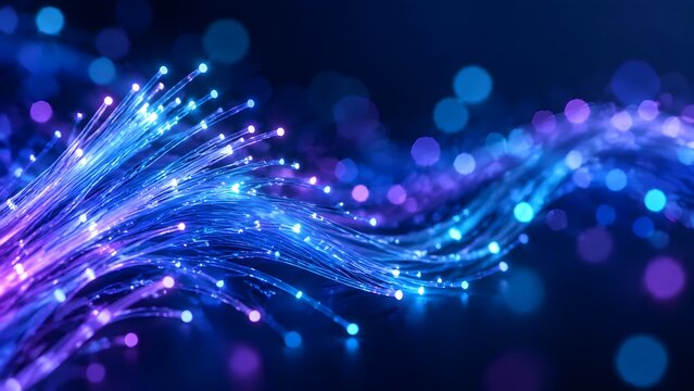 Abstract glowing fiber optics with blue and purple lights on dark