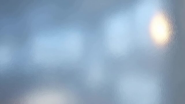 すりガラスの質感 光がゆっくり動く半透明の背景素材 ループ