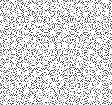 Abstract seamless pattern of interlocking black circular as isolated element