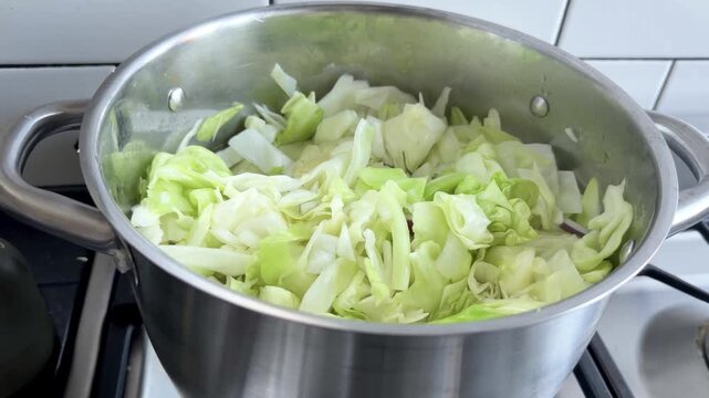 Chopped Cabbage in a Pot Before the Lid Is Placed On