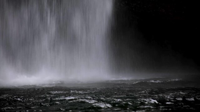 Static close up Tavoro waterfall free falling water into pools in Bouma National Heritage Park on Taveuni Island, Fiji, South Pacific
