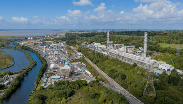 Rocksavage gas-fired power station and chemical manufacturing facilities near Runcorn, Cheshire, UK, with industrial buildings, pipelines and energy infrastructure in a major industrial area.