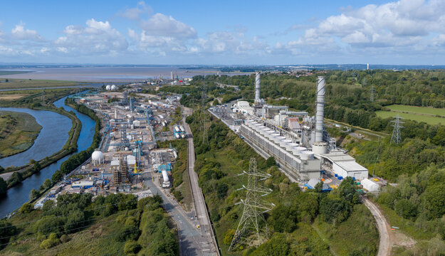 Rocksavage gas-fired power station and chemical manufacturing facilities near Runcorn, Cheshire, UK, with industrial buildings, pipelines and energy infrastructure in a major industrial area.