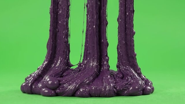 Halloween green screen purple slime creepy gooey sticky horror dripping ooze liquid thick flowing spooky fluid gelatinous substance vibrant monster