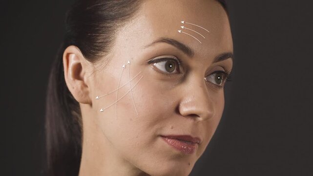 Close-up of a beautiful woman with animated white lines on her face illustrating a facial lifting concept. Ideal for beauty salons, cosmetic services, skincare and aesthetic industry.