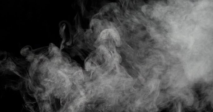 Smoke on black background in super slow motion