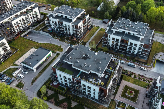 Apartment complex with balconies patios and garden areas