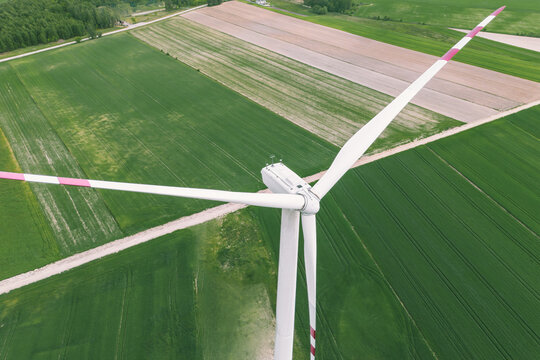 Electric turbine spinning in rural farmland