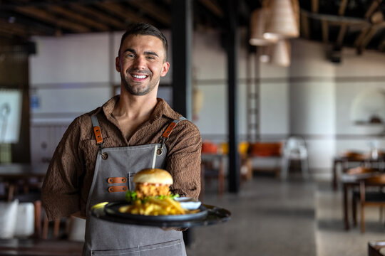 Proud cafe owner standing confidently behind the counter, ready to serve customers with a warm smile
