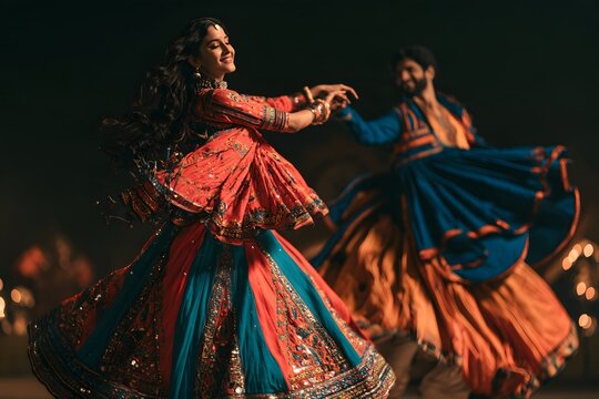 Two energetic dancers in vibrant traditional indian attire twirling together in a celebratory festive dance