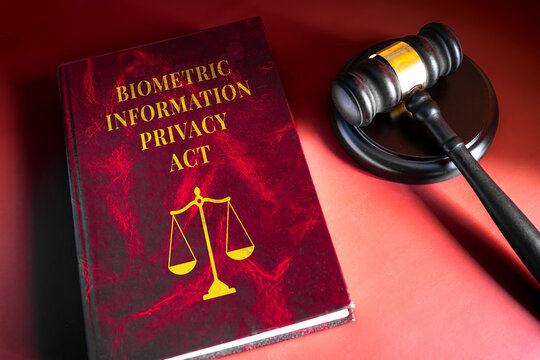 Biometric Information Privacy Act dark red law book with judge gavel on red background, data privacy regulation concept