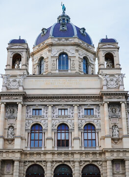 Ornate historic museum facade with domed roof and sculptures