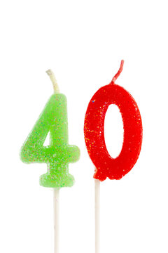 Candles in the shape of number 40 and number 0 on sticks for a birthday celebration