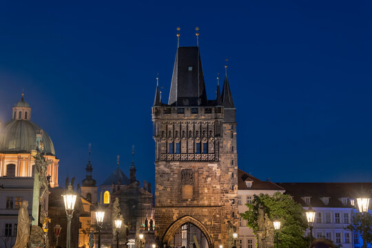 The illuminated Old Town Bridge Tower decorates the city of Prague