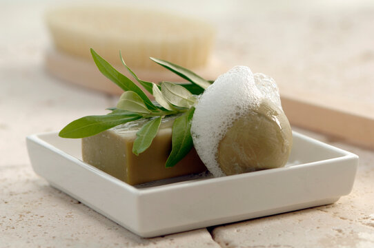Soaps with herbal leaf on soap dish