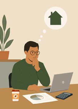 A man calculates a mortgage for a new house