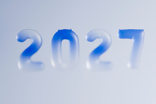 Blue 3D balloons form the year 2027 for a new year celebration