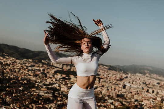 Female dancer performs contemporary dance outdoors in Barcelona