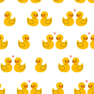 Seamless pattern of yellow rubber ducks in loving pairs with pink hearts on white background. Flat vector illustration